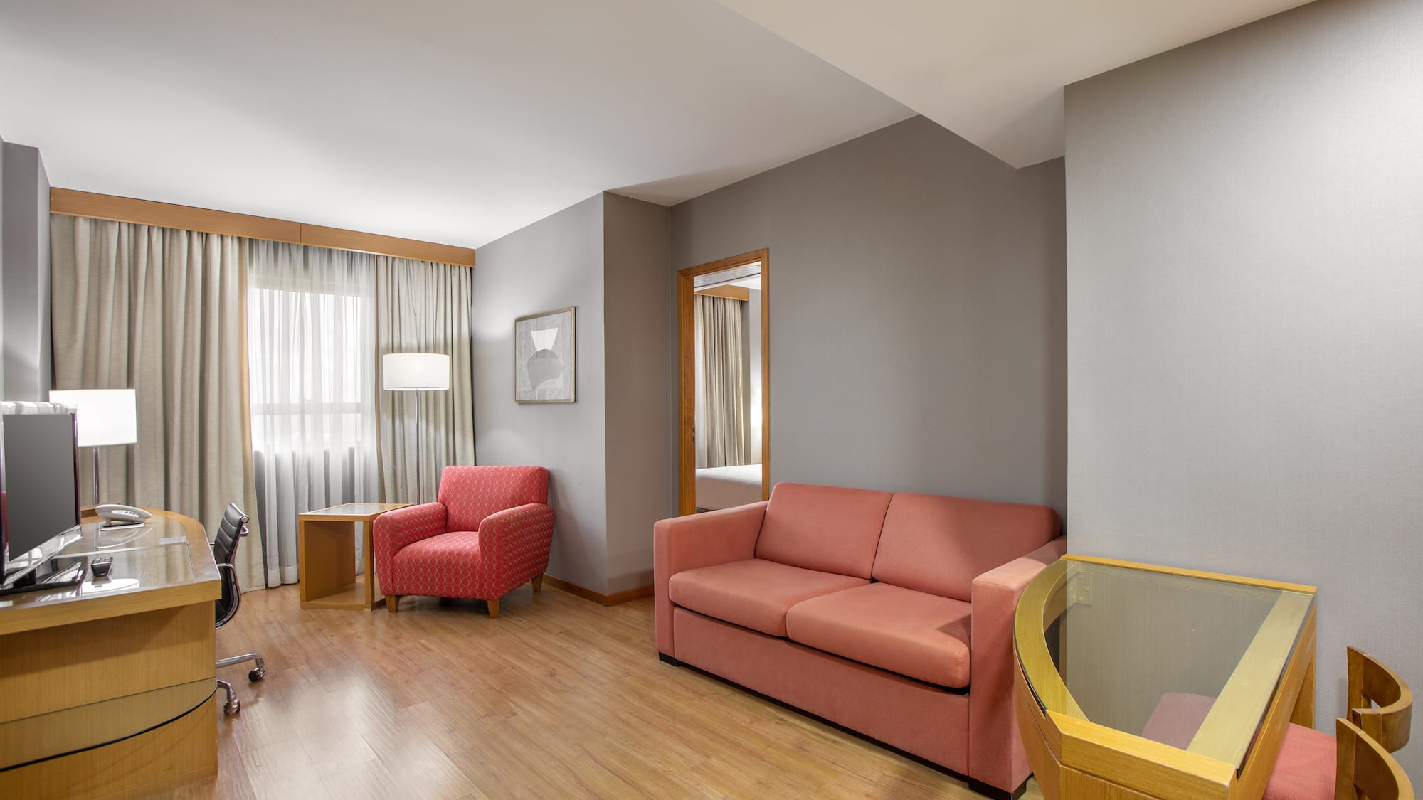 a room with a couch and a chair