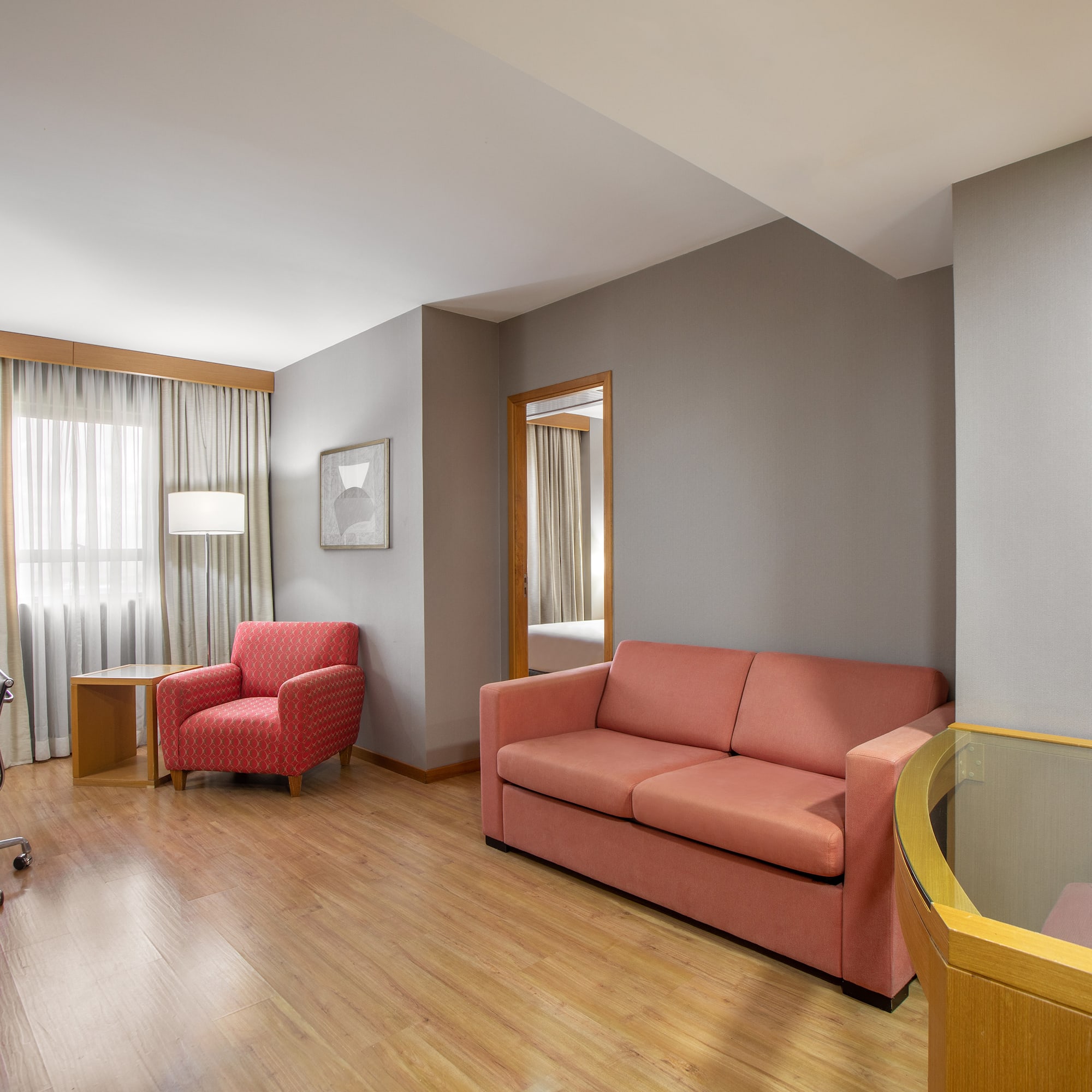 a room with a couch and a chair