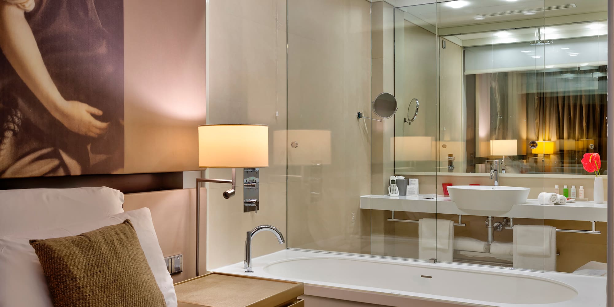 a bathroom with a glass shower door