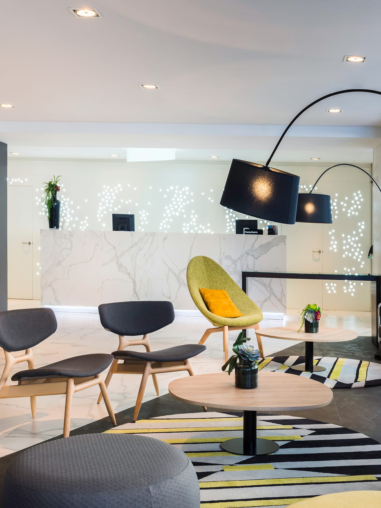 a room with a round table and chairs