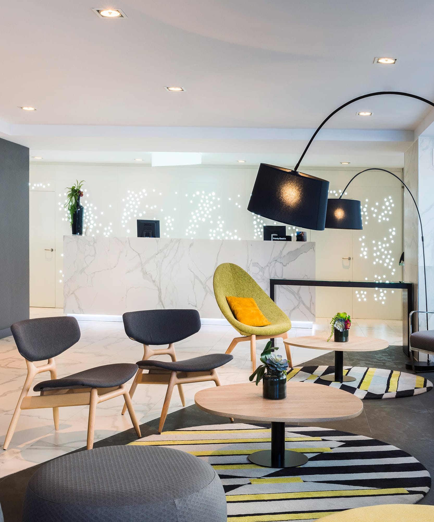 a room with a round table and chairs