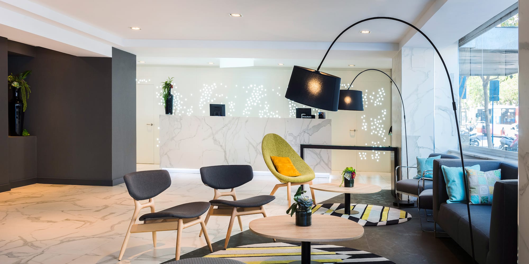 a room with a round table and chairs