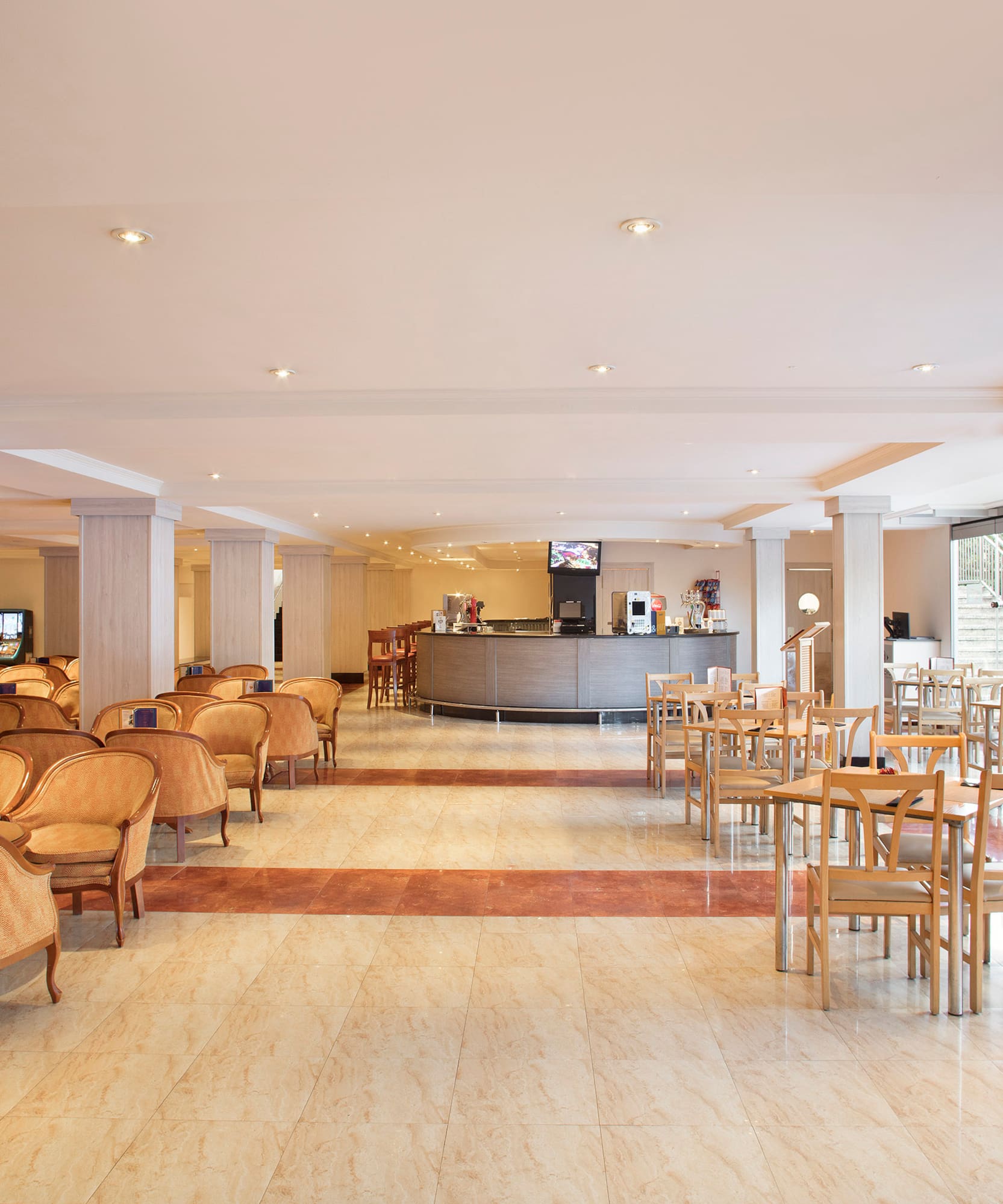 a room with chairs and tables