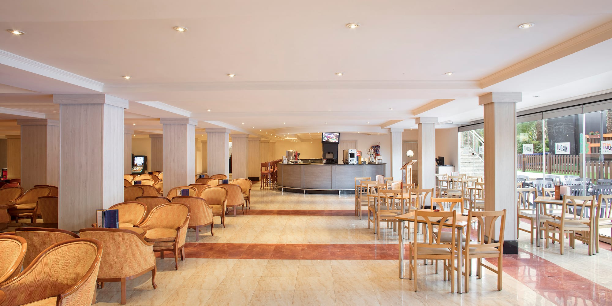 a room with chairs and tables