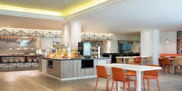 a room with a buffet and a table