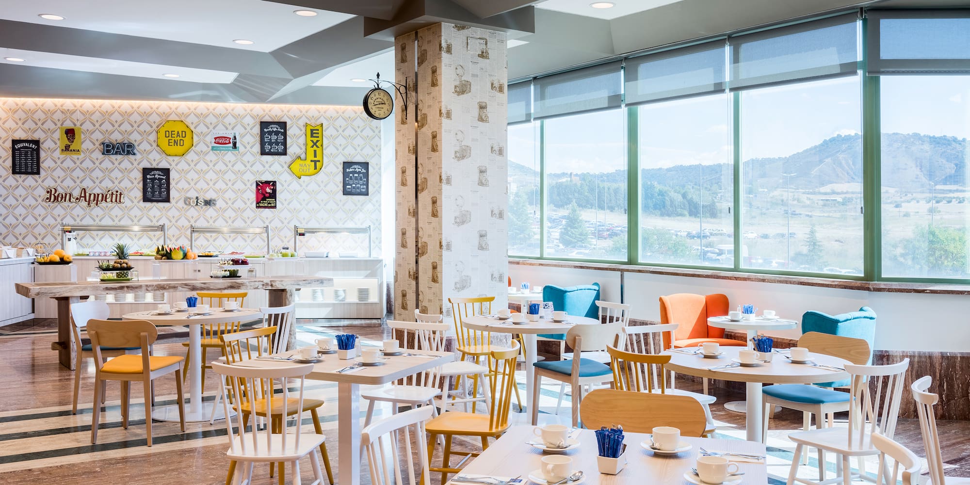 a room with tables and chairs