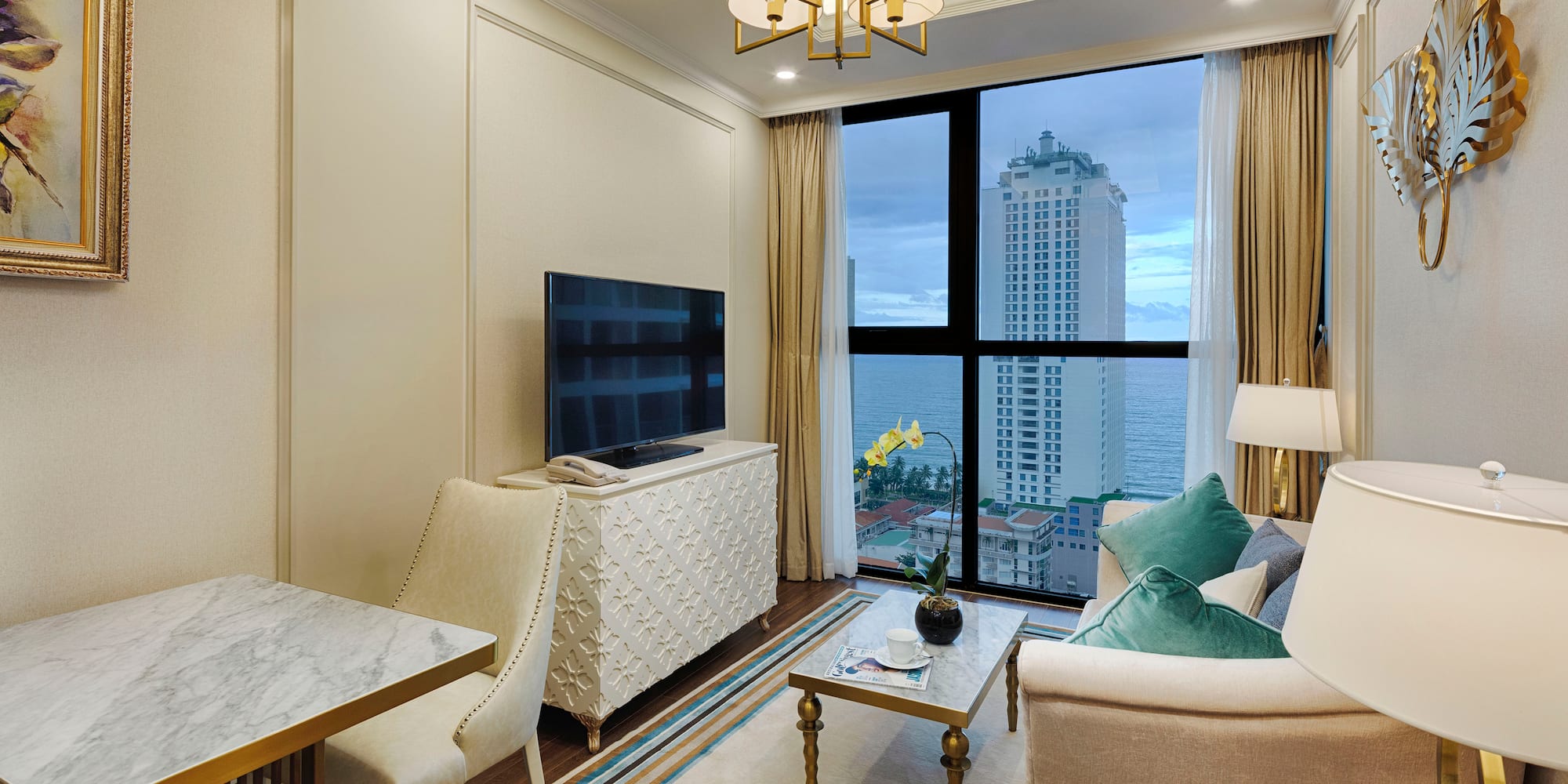 a living room with a large window and a large television