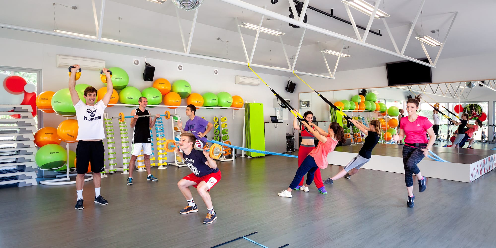 a group of people in a gym