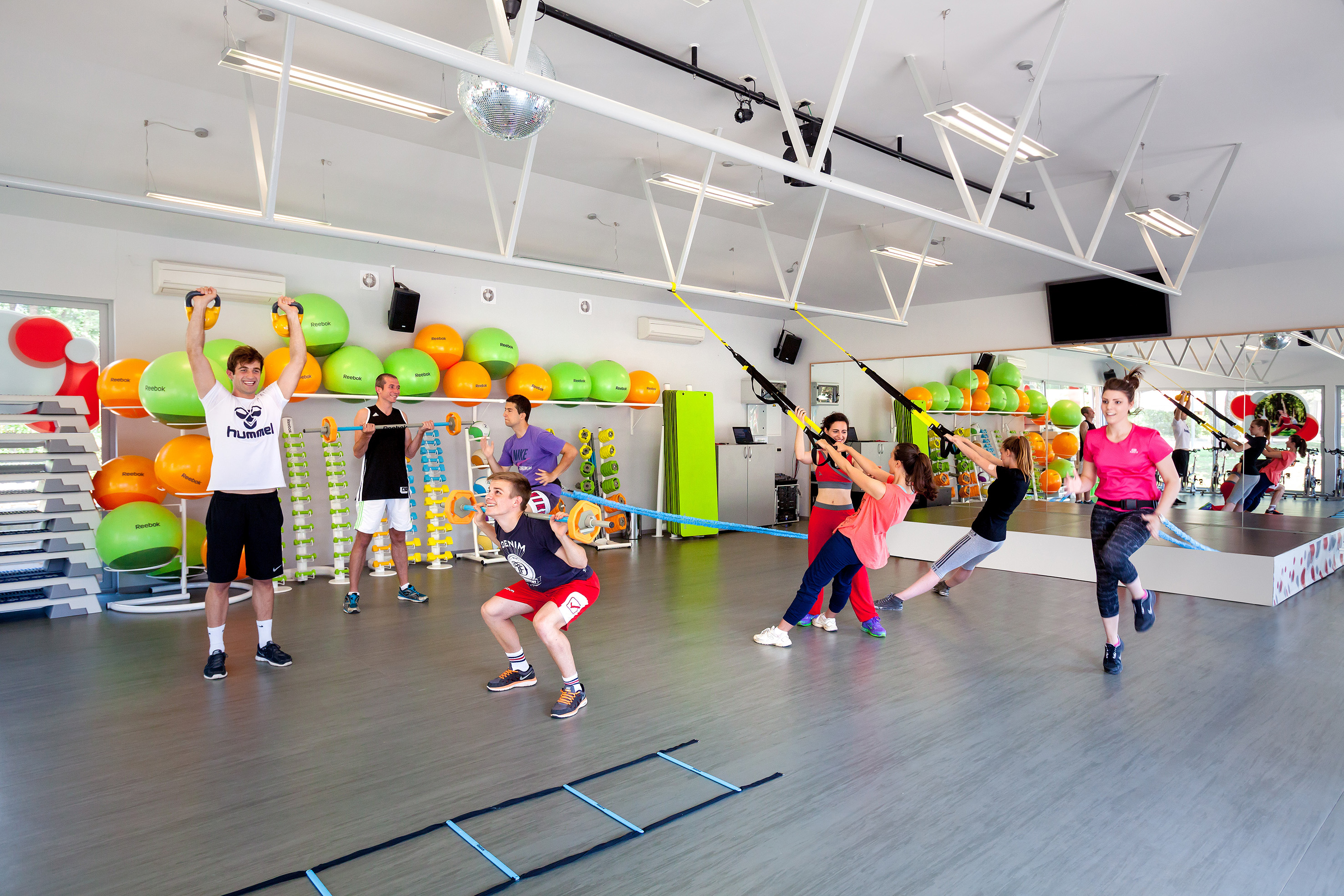 a group of people in a gym