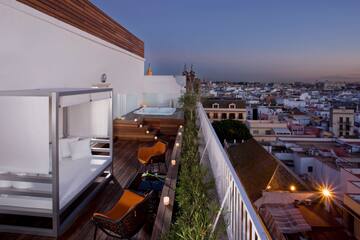 a balcony with a view of a city
