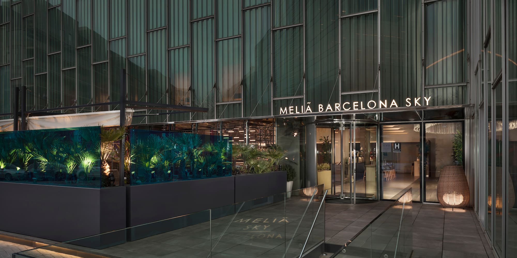 a building with glass walls and a glass wall