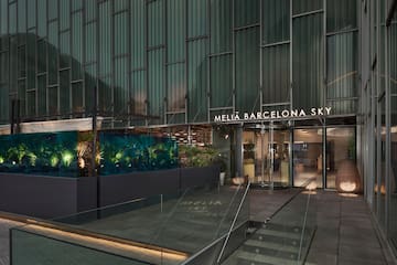 a building with glass walls and a glass wall