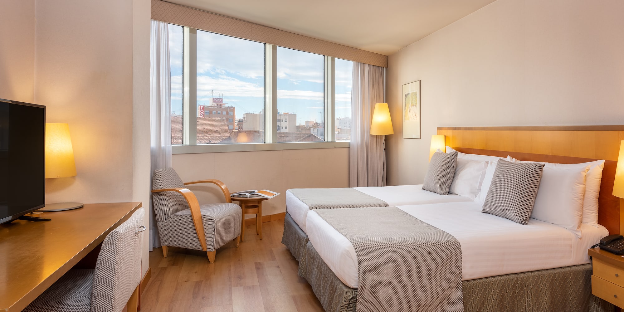 a room with a bed and a chair