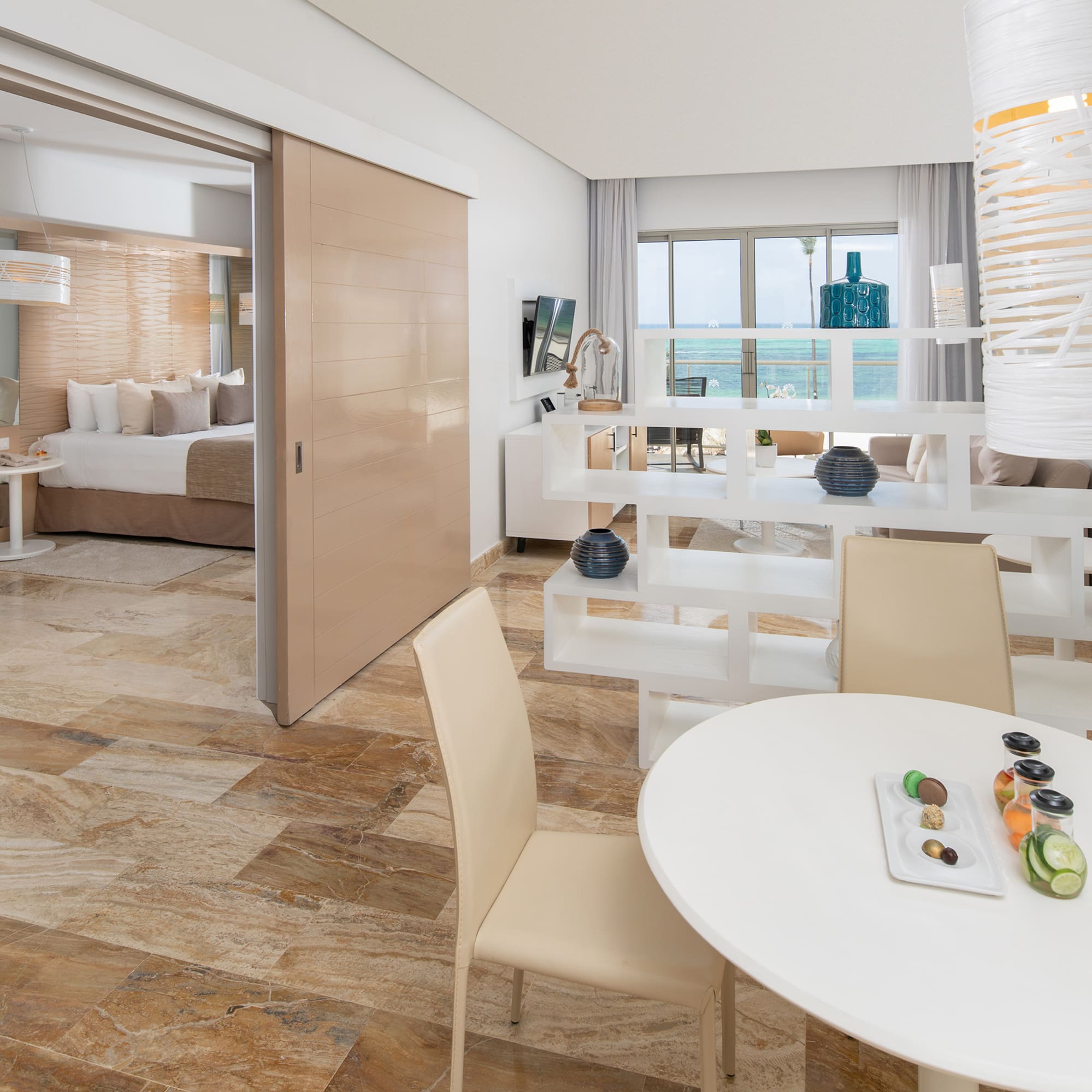 a room with a table and chairs