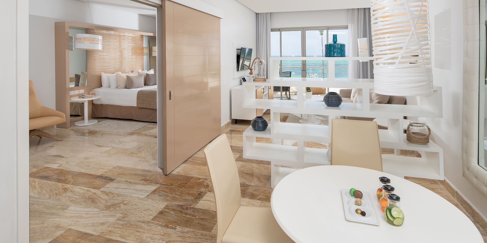 a room with a table and chairs