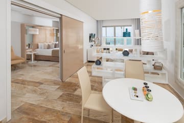 a room with a table and chairs