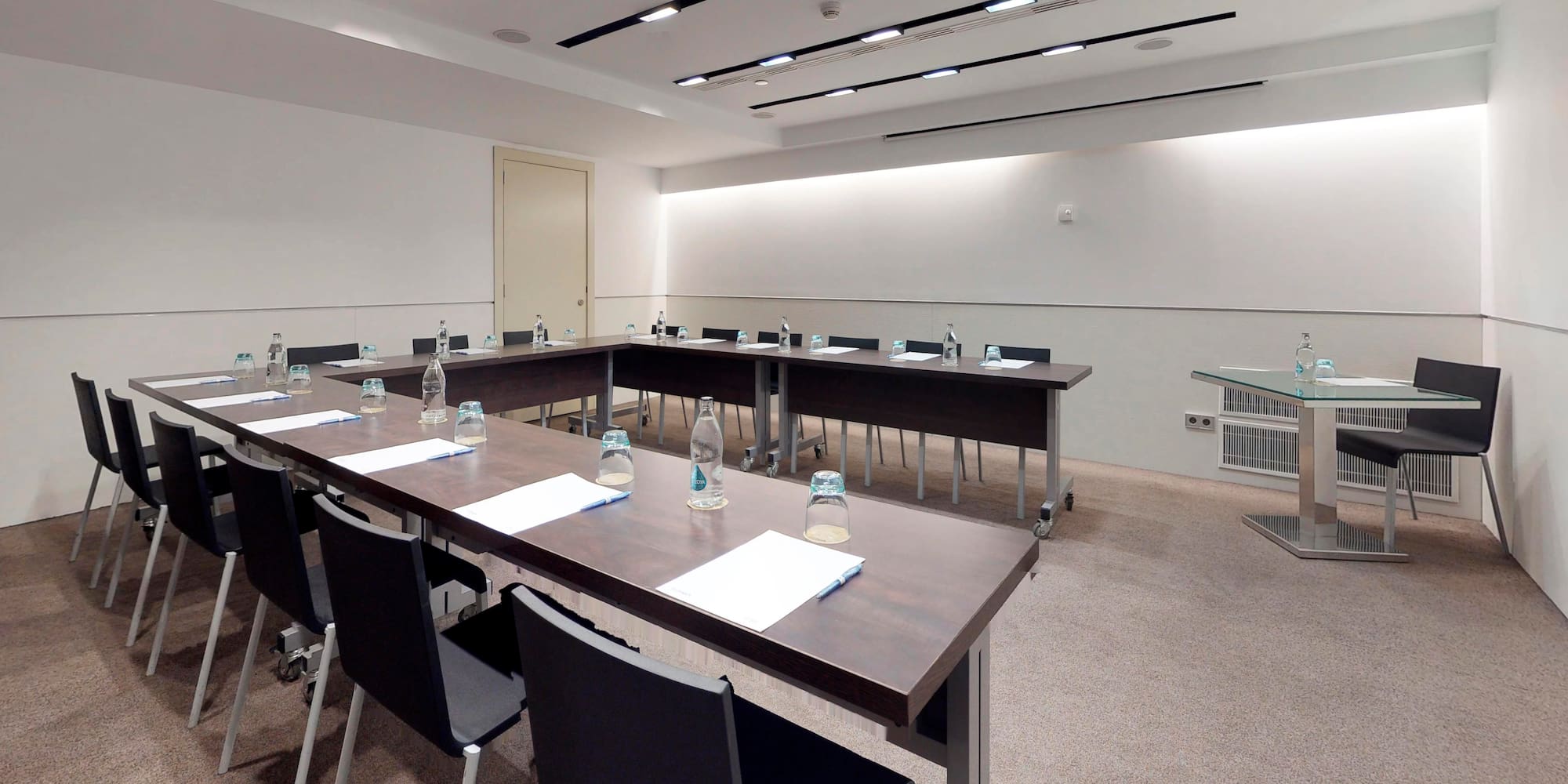 a room with tables and chairs