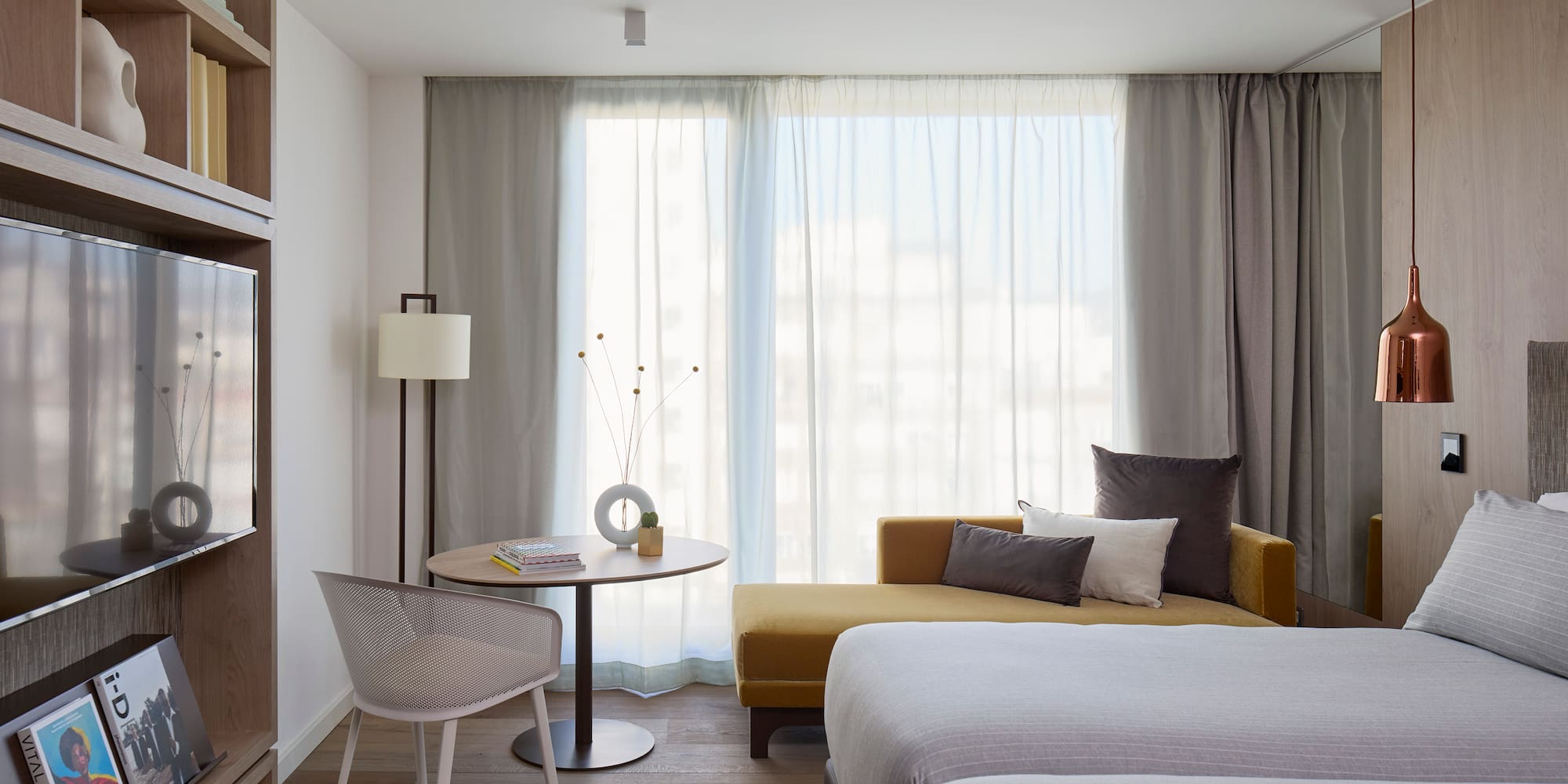 a room with a bed and a table