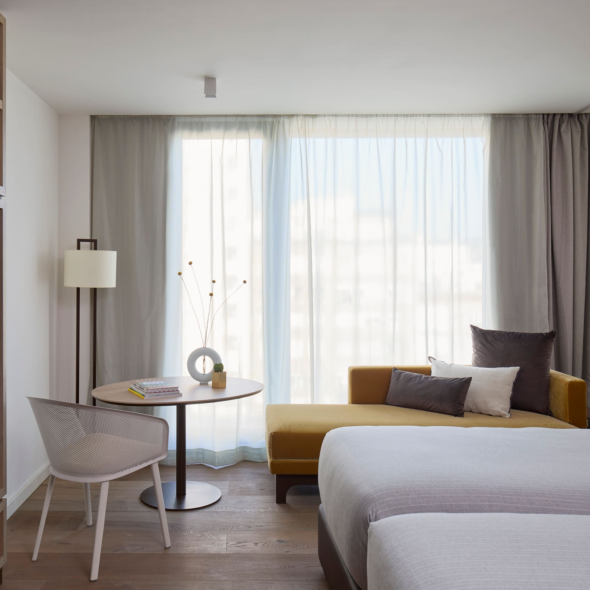 a room with a bed and a table