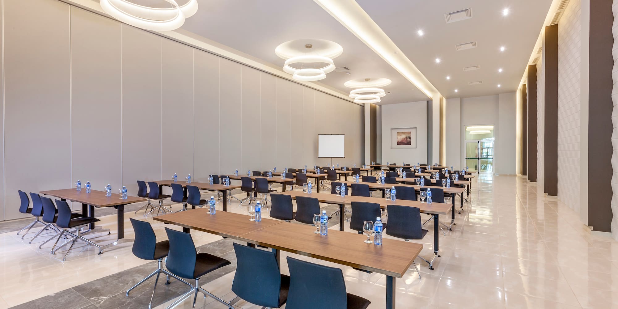 a room with tables and chairs