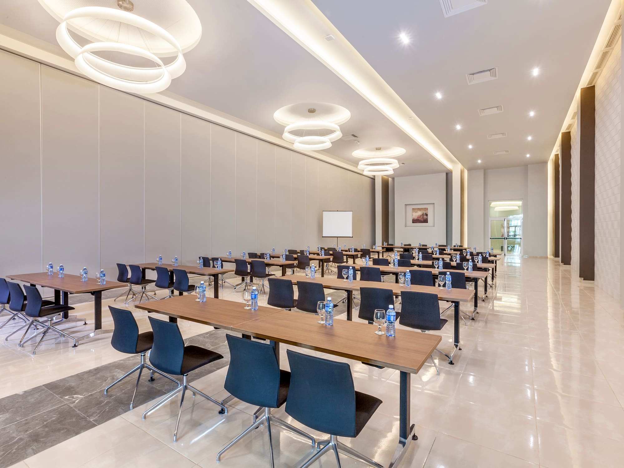 a room with tables and chairs