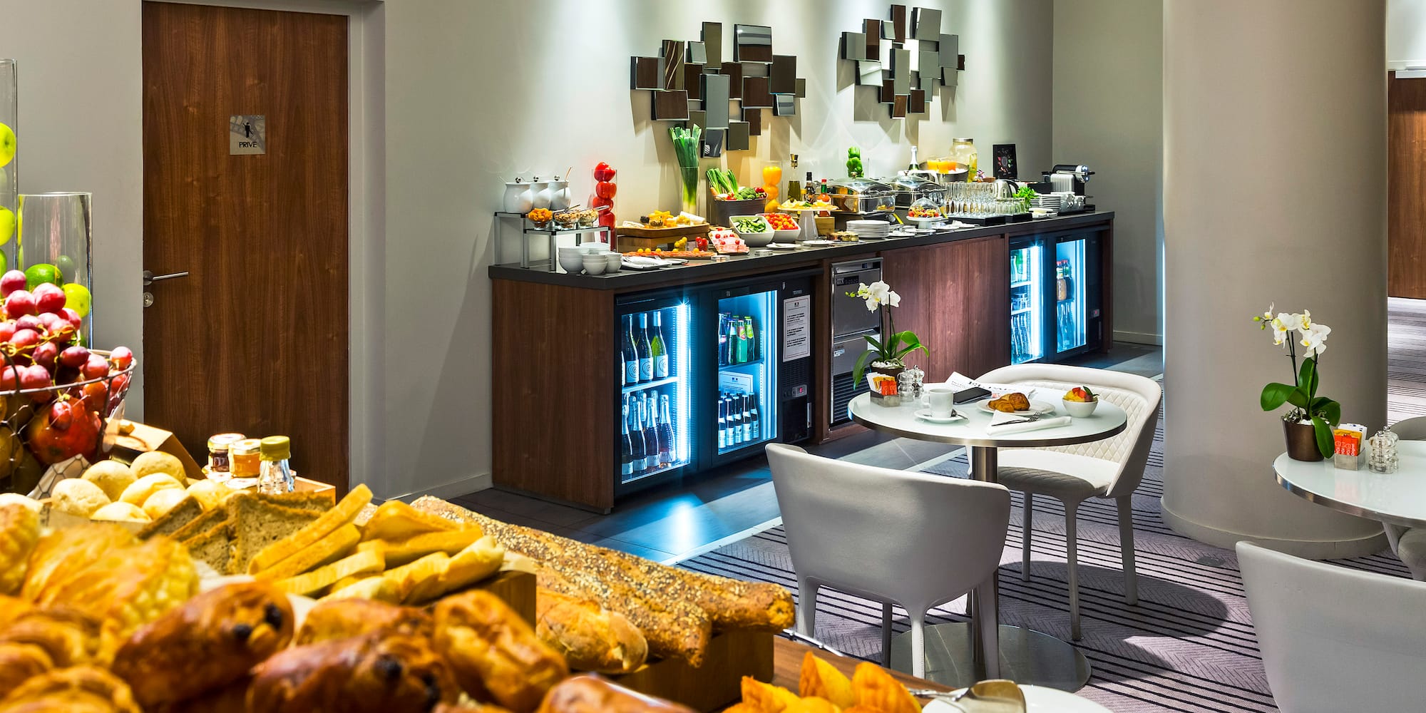 a room with a buffet and food