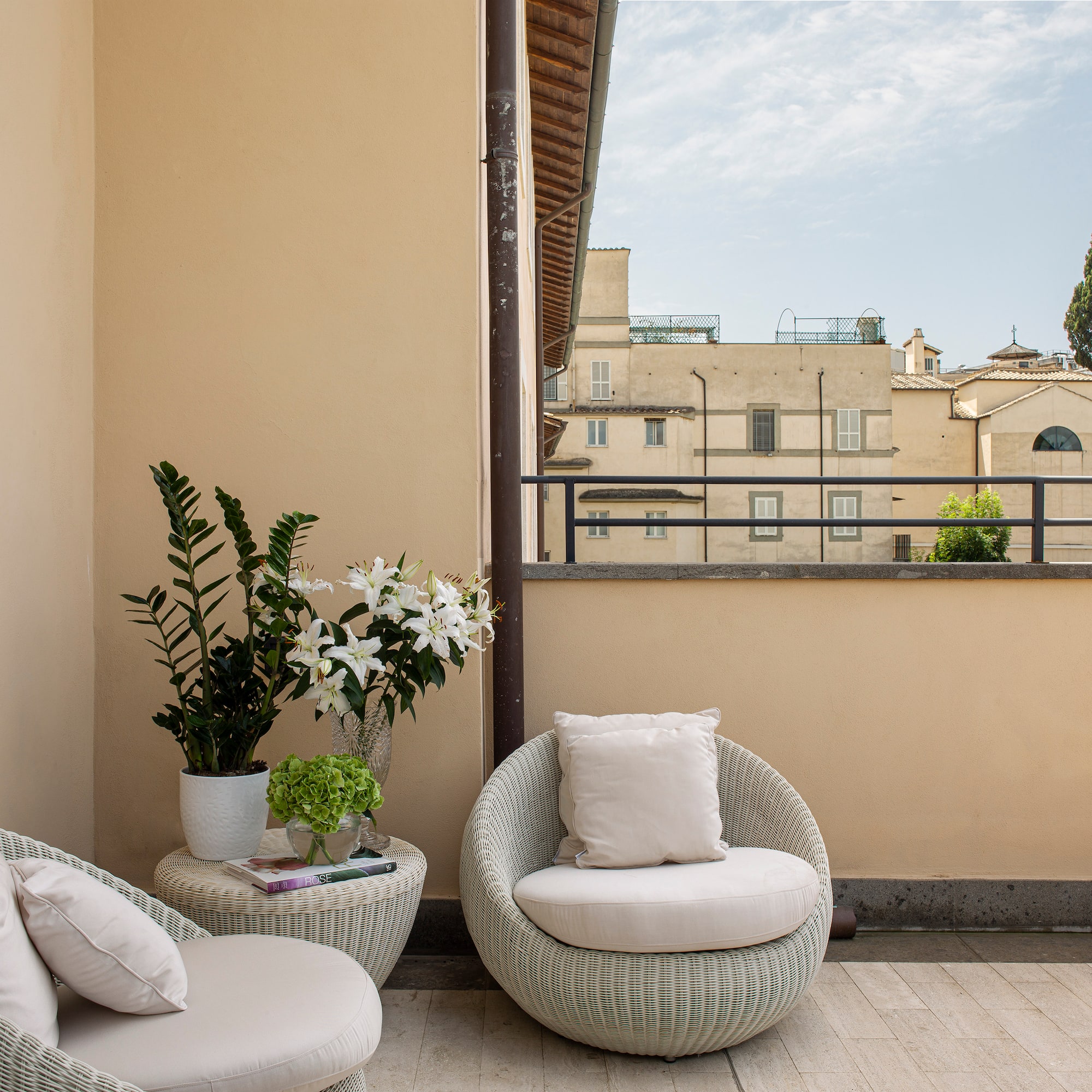 a chair and table on a patio