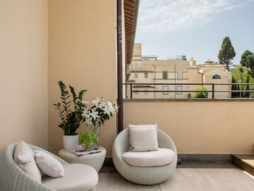 a chair and table on a patio