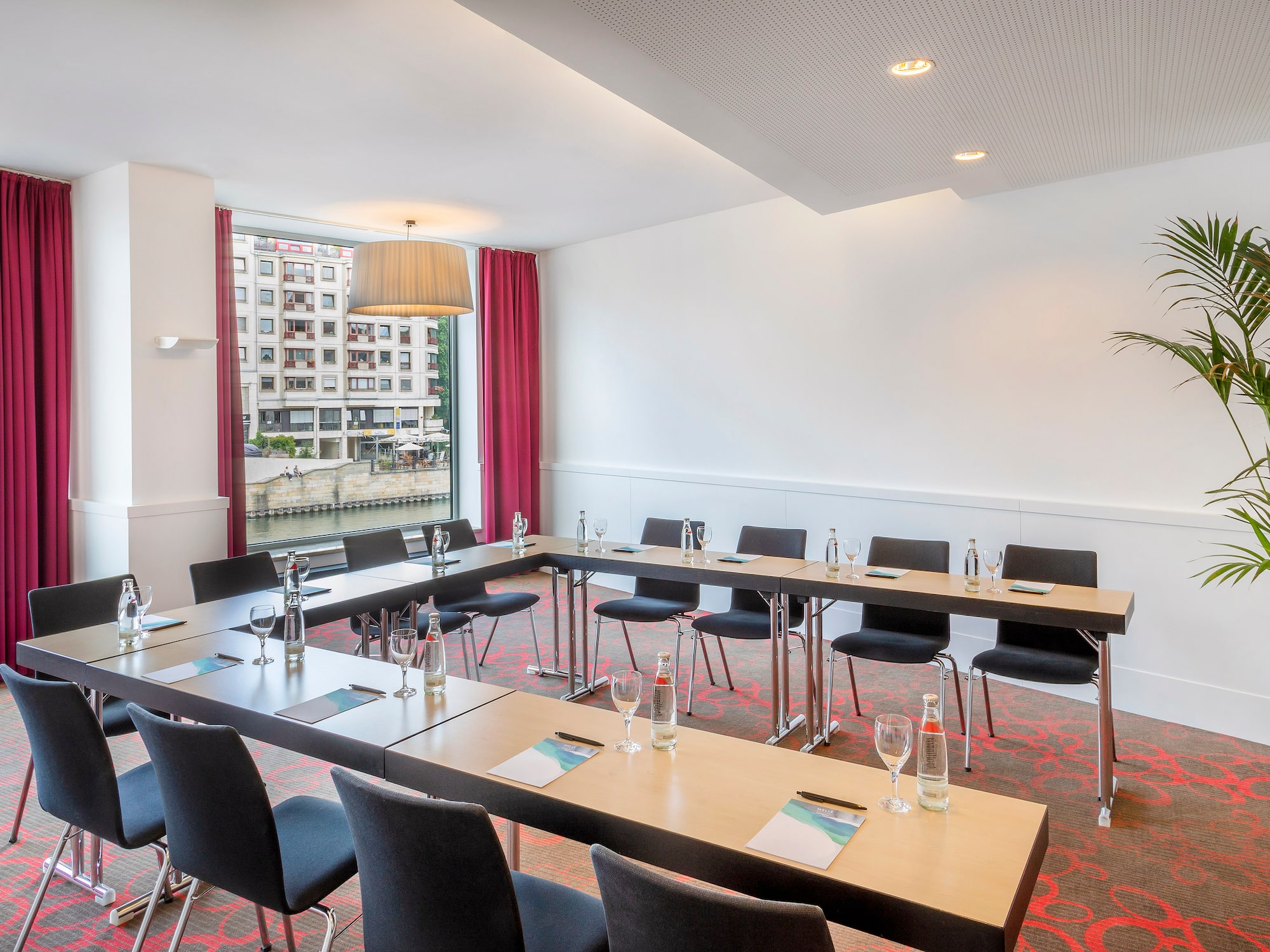 a room with tables and chairs