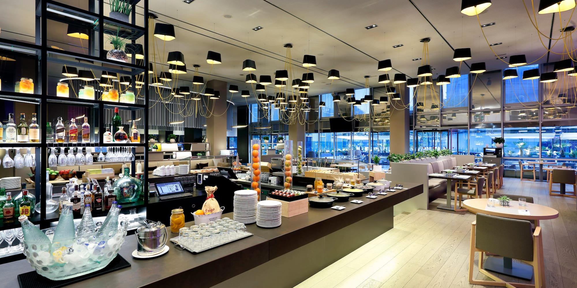 a restaurant with many tables and chairs