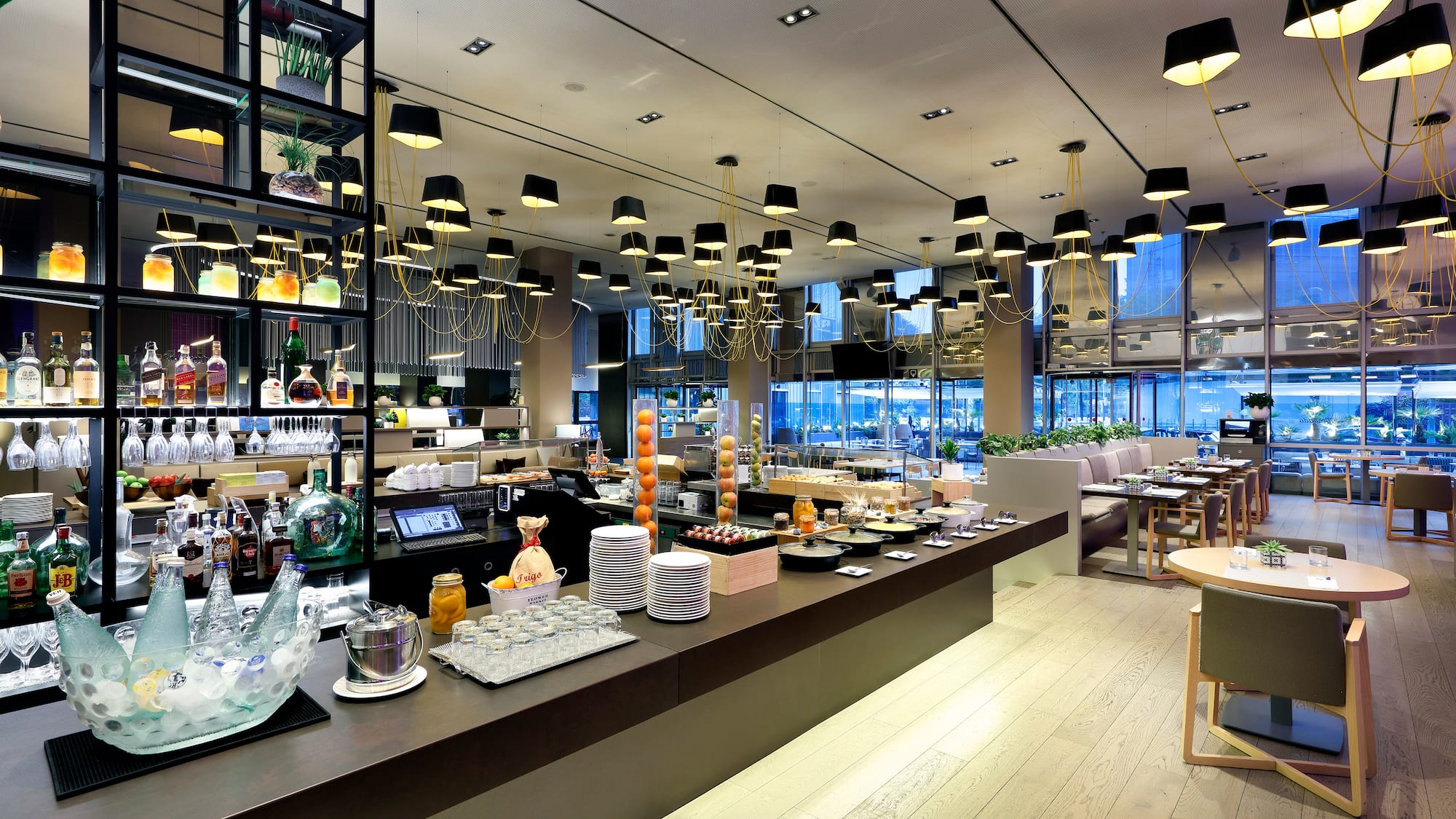 a restaurant with many tables and chairs