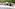 a beach with tents and people on it