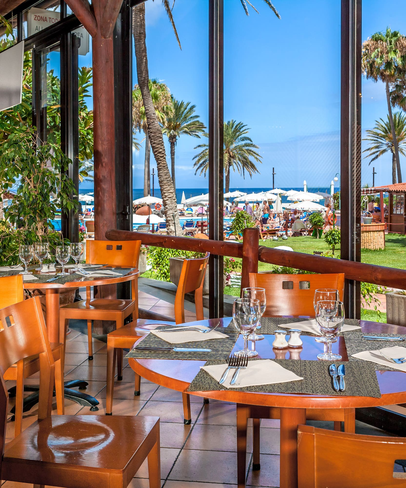 a restaurant with tables and chairs