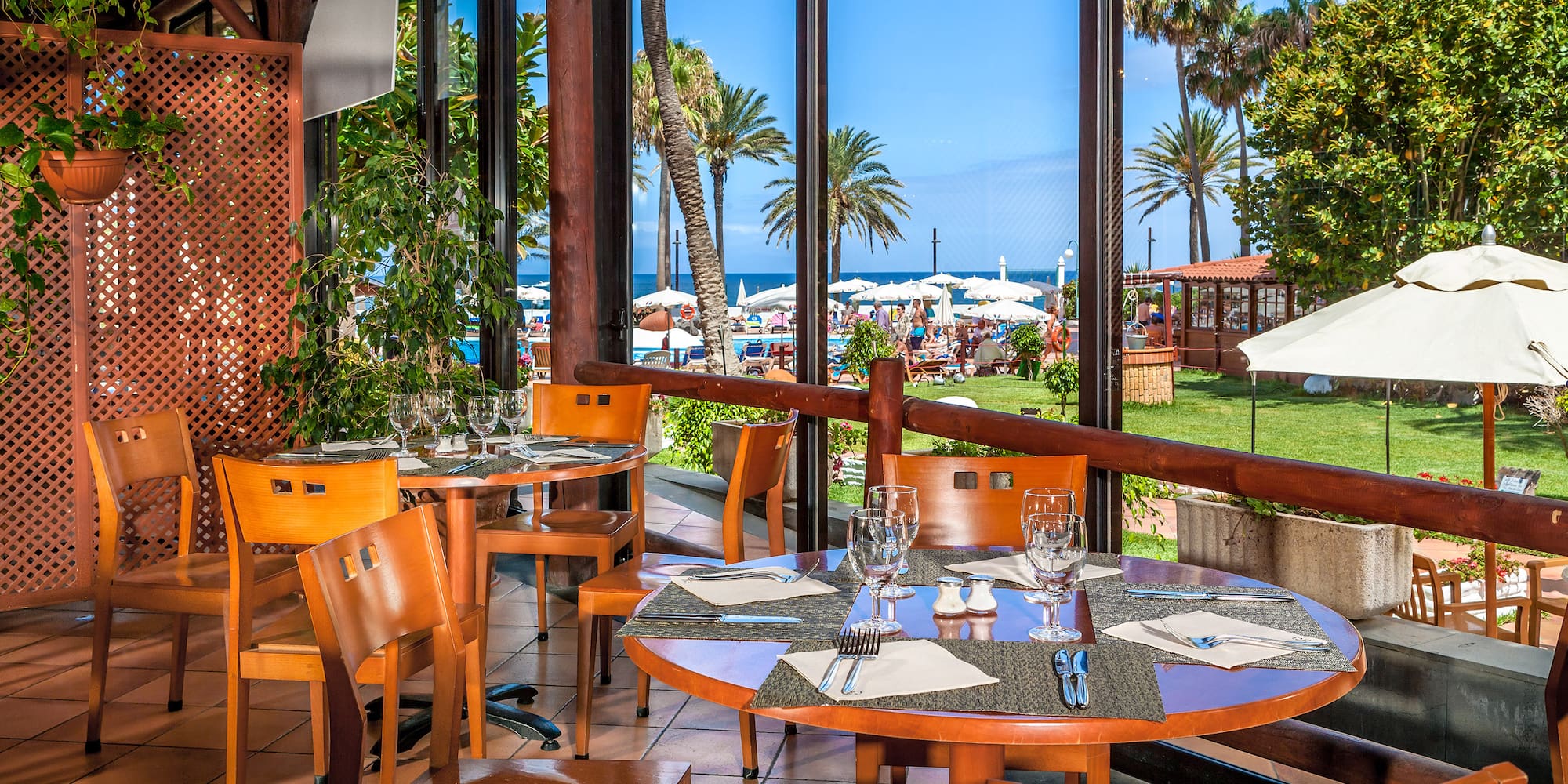 a restaurant with tables and chairs