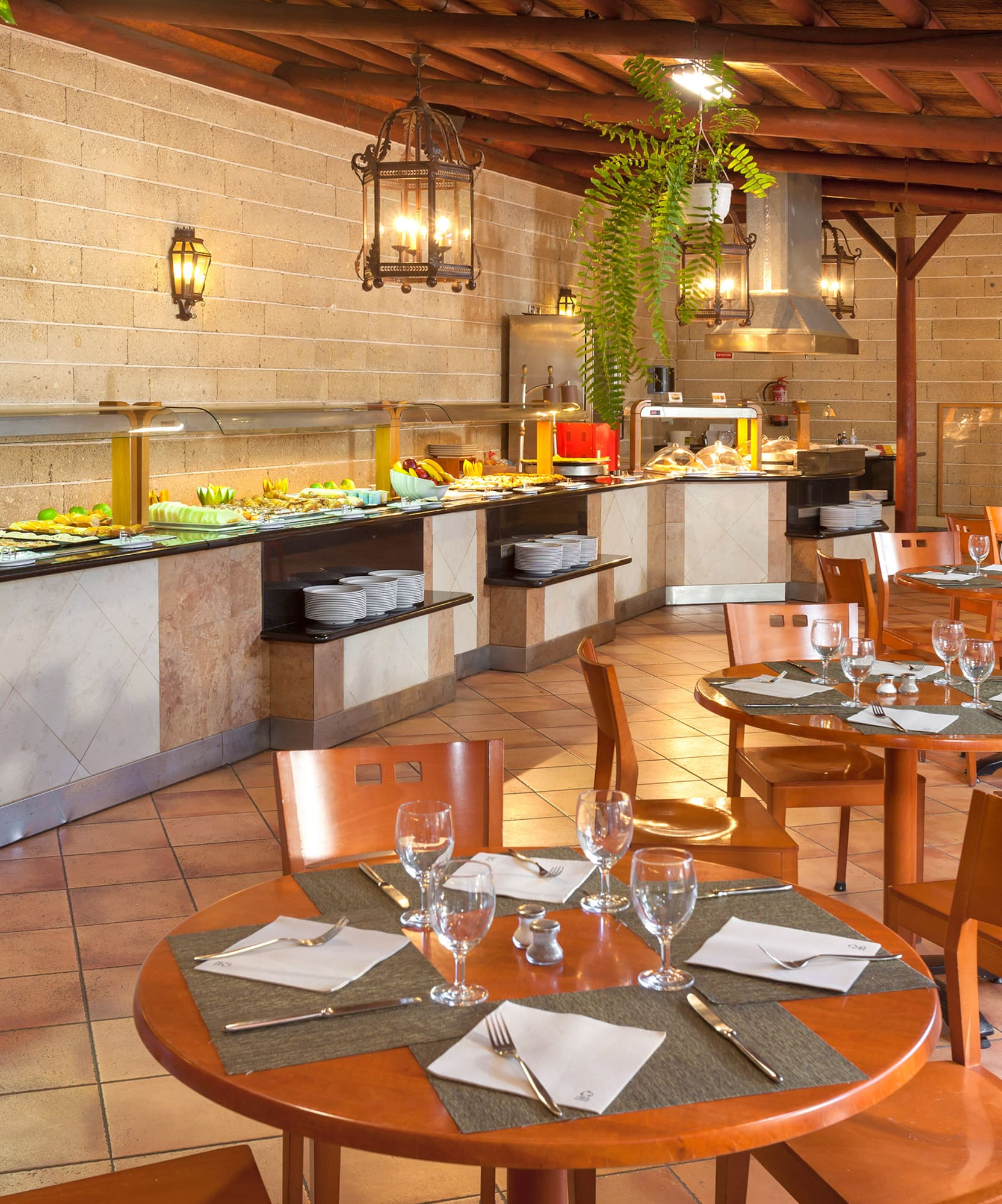 a restaurant with tables and chairs