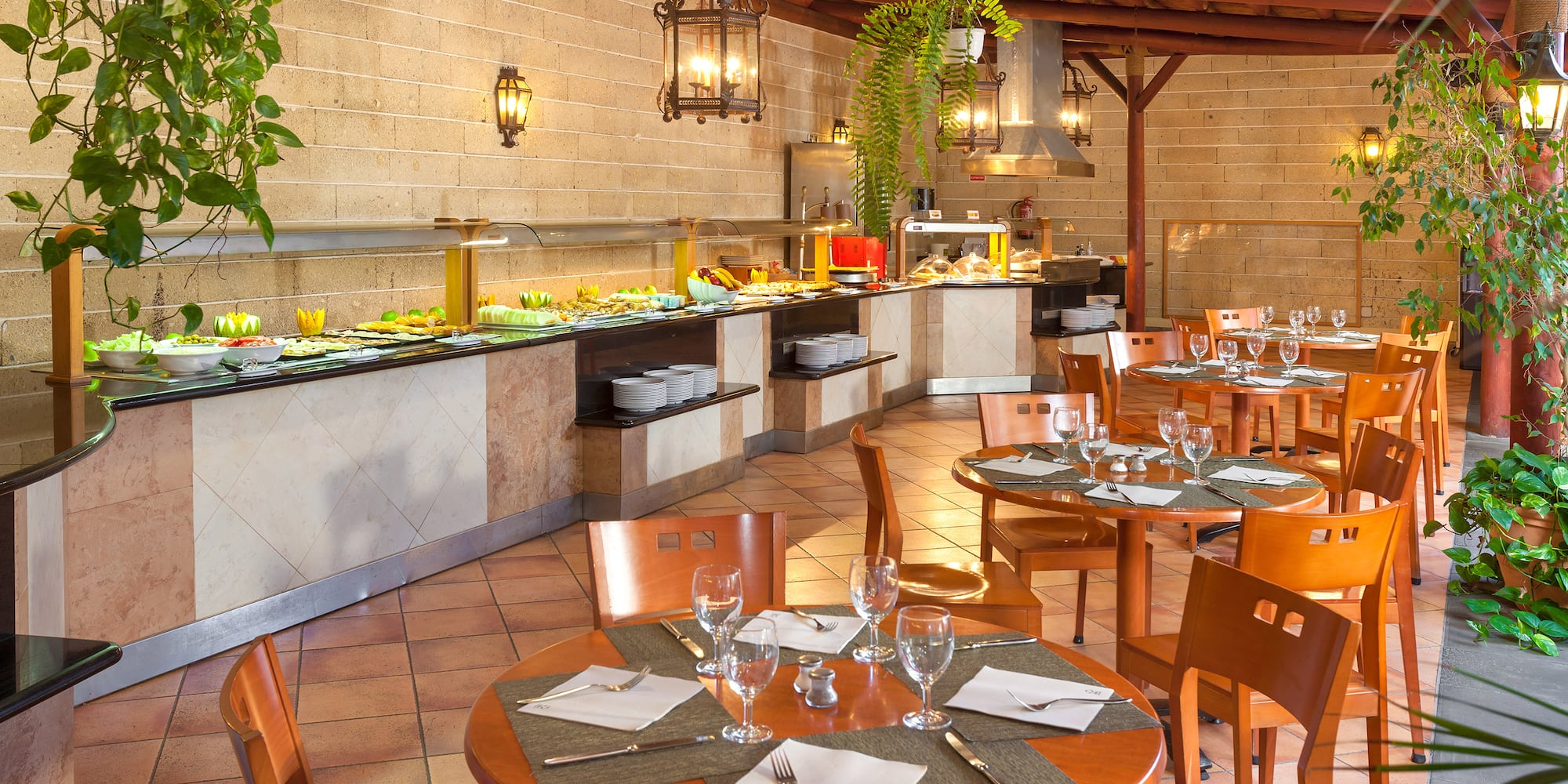 a restaurant with tables and chairs