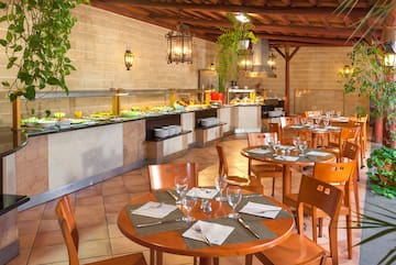 a restaurant with tables and chairs