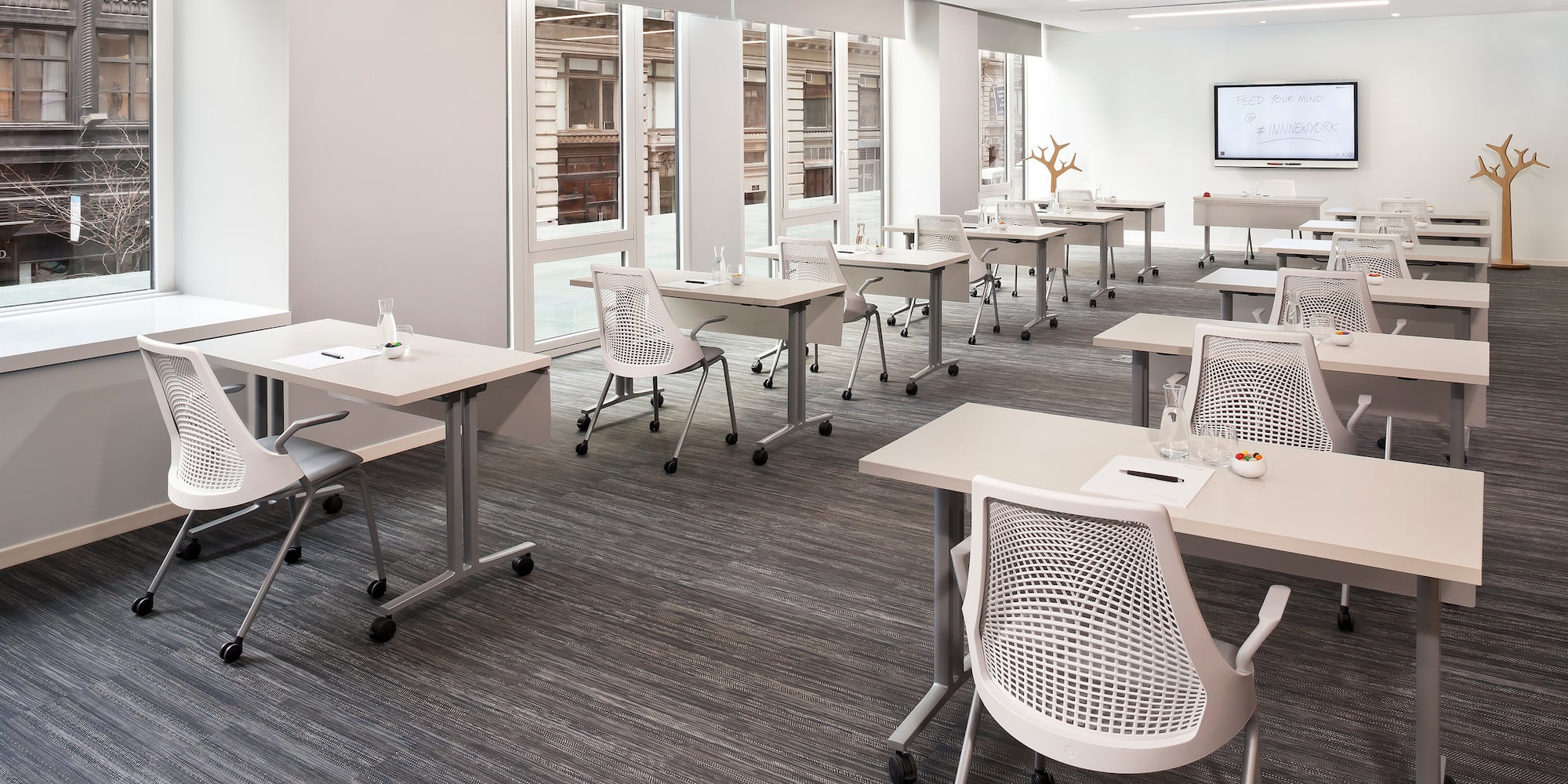 a room with tables and chairs