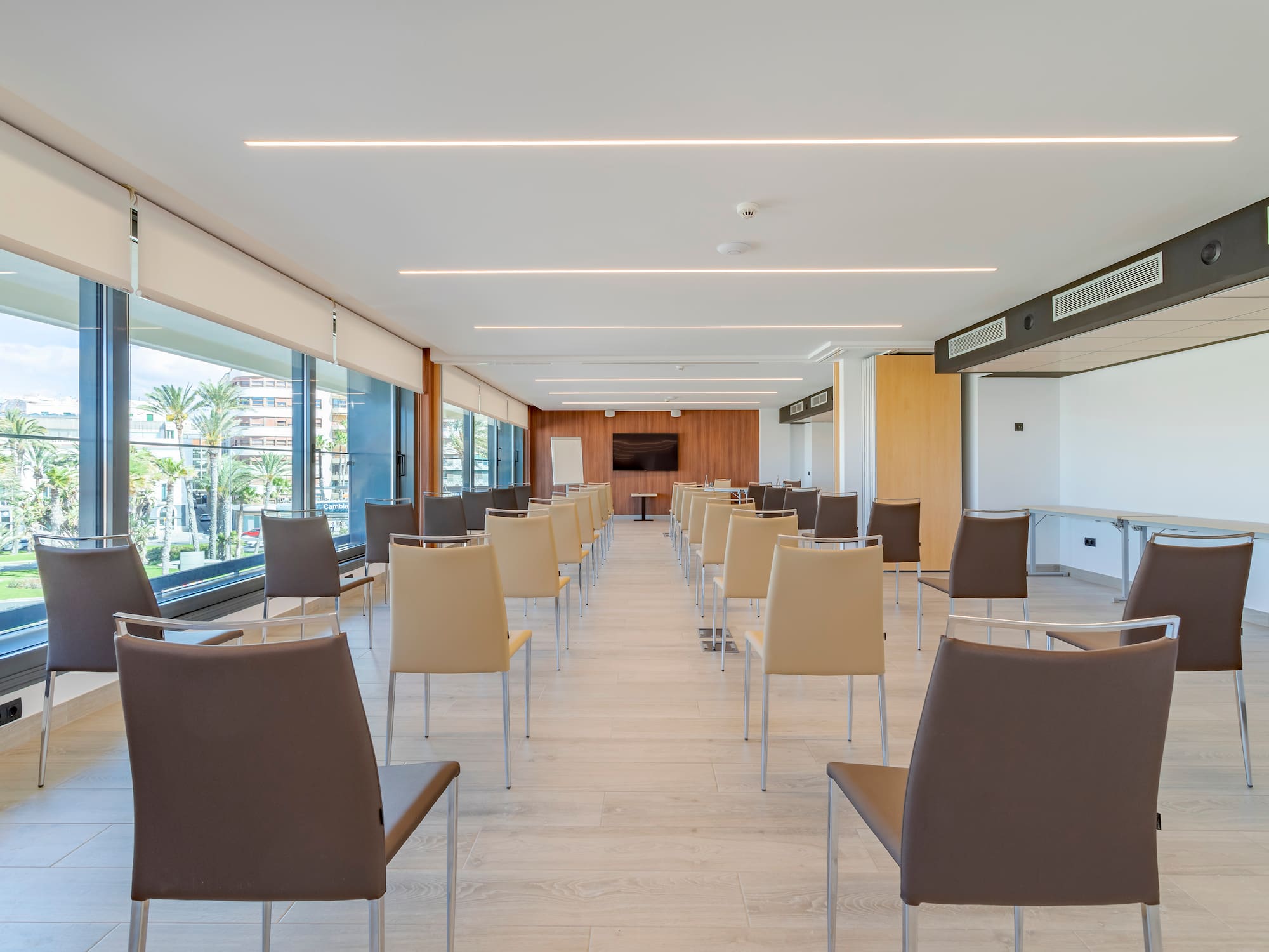 a room with chairs and tables