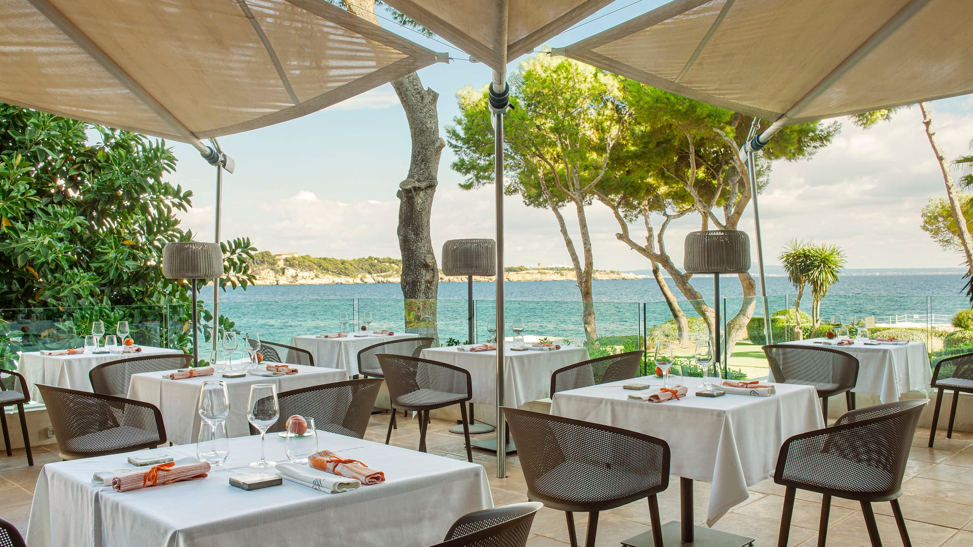 a restaurant with tables and chairs