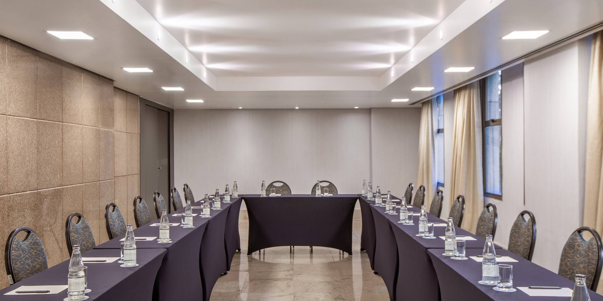 a room with tables and chairs