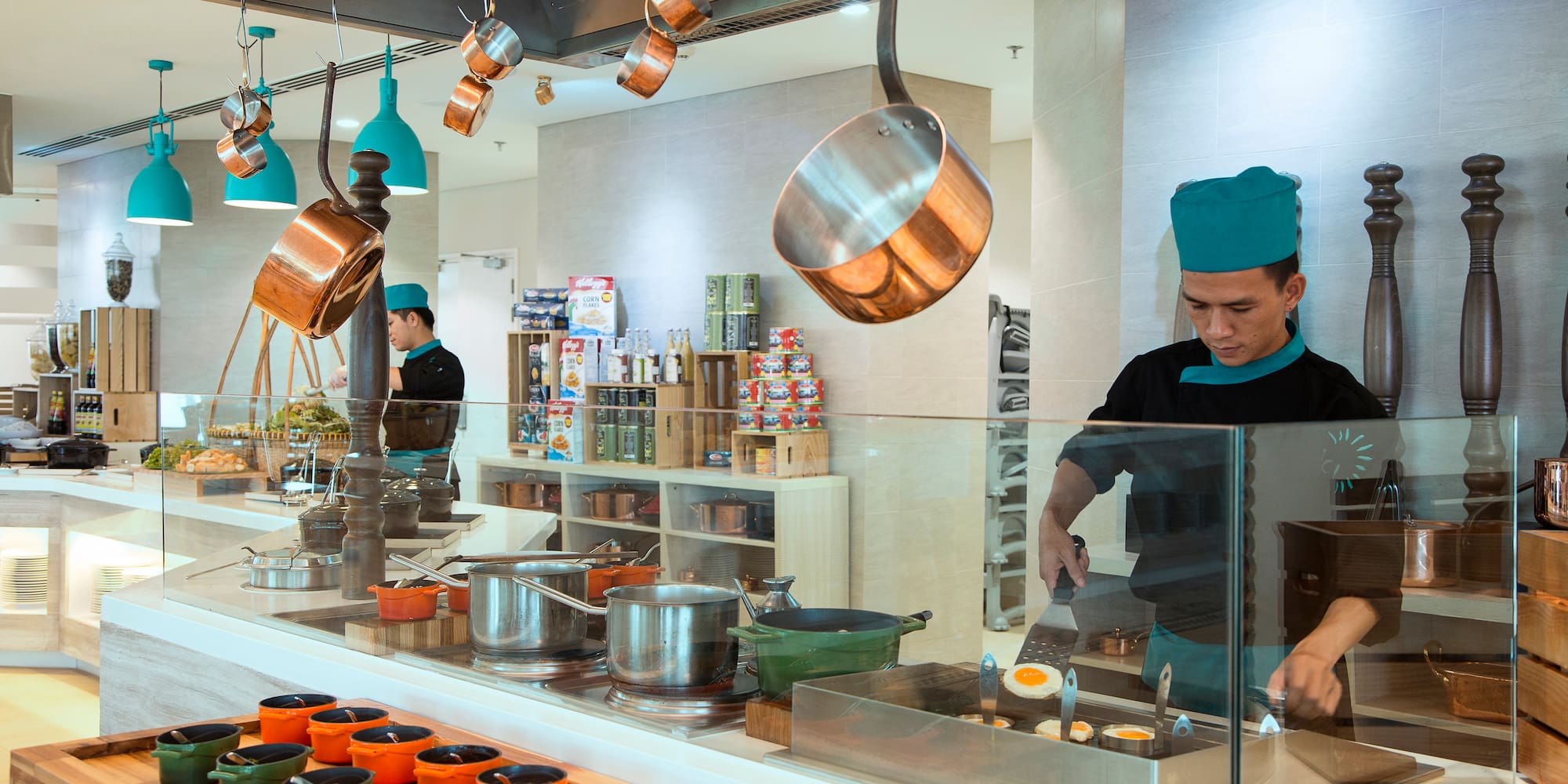 a man cooking in a kitchen