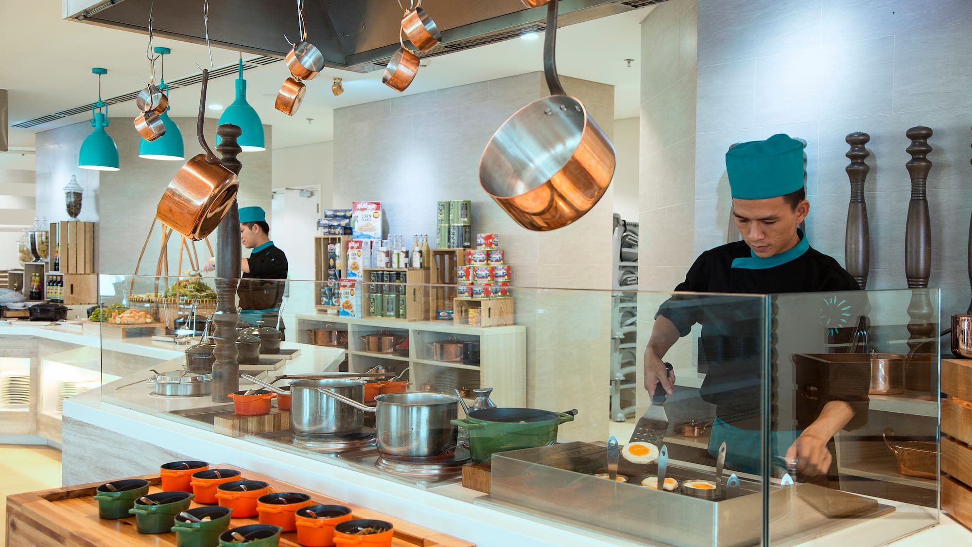 a man cooking in a kitchen