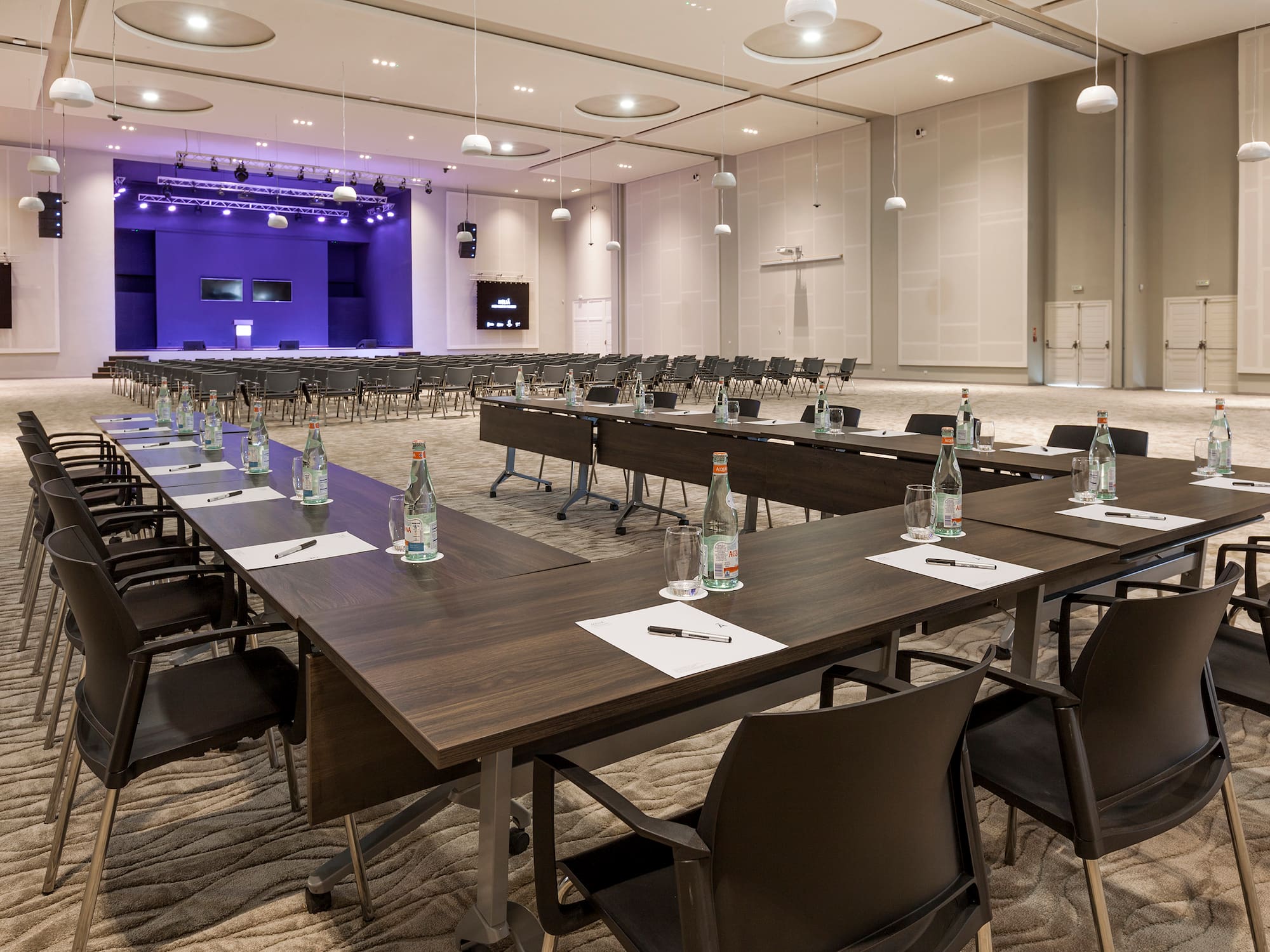 a room with tables and chairs