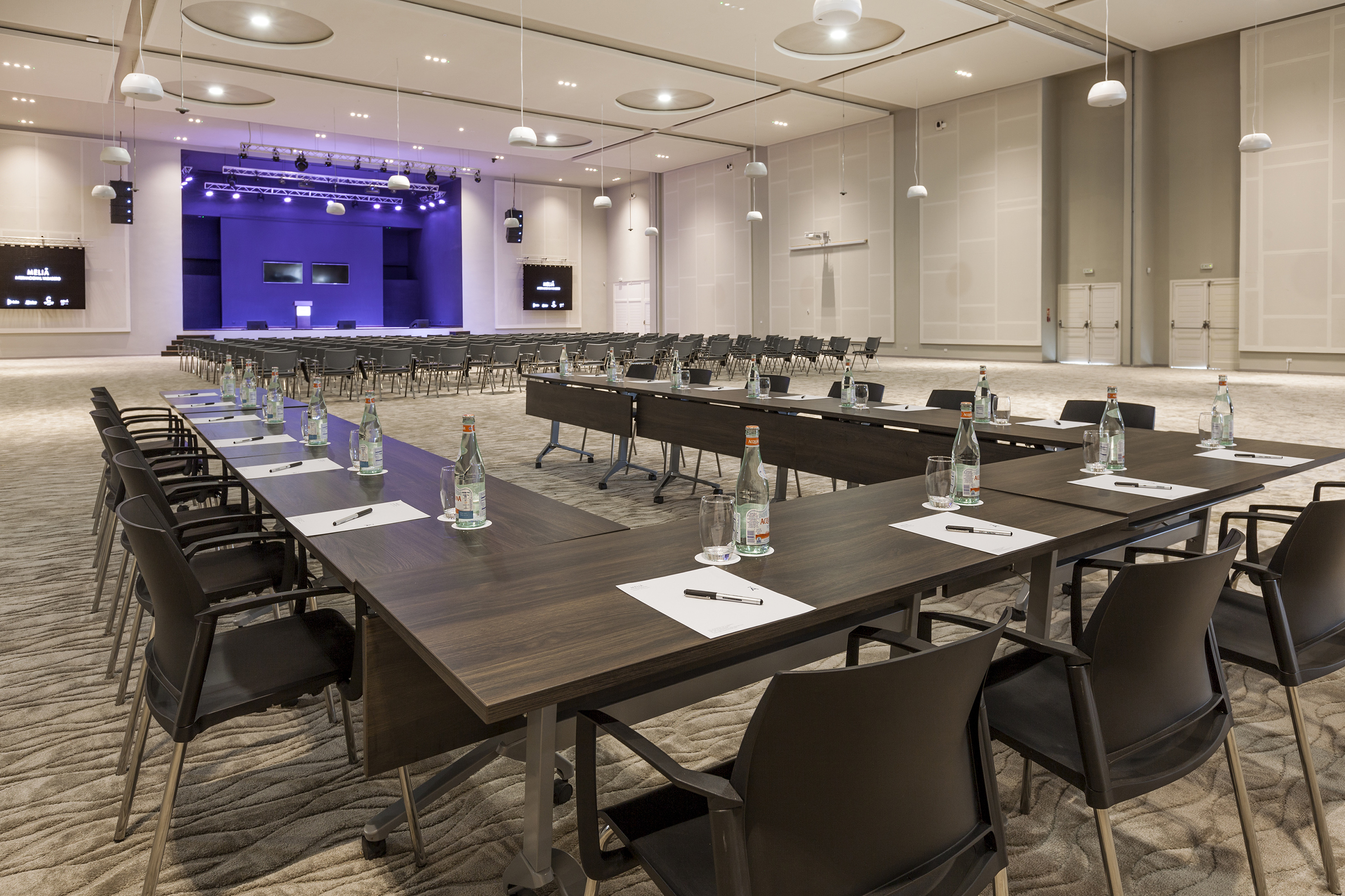 a room with tables and chairs