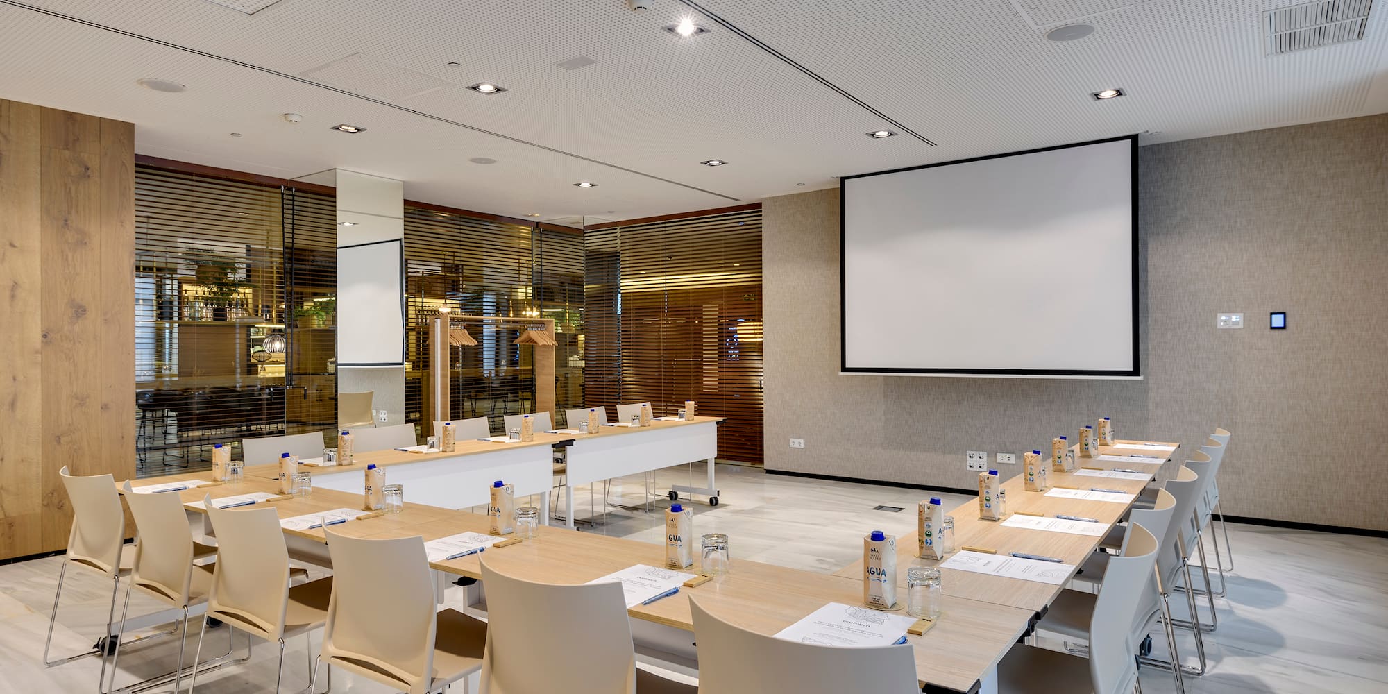 a room with tables and chairs