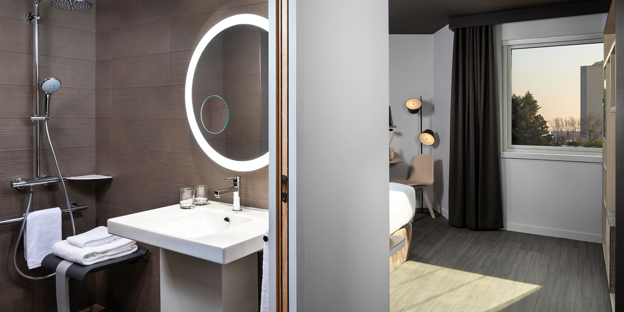 a bathroom with a mirror and a sink