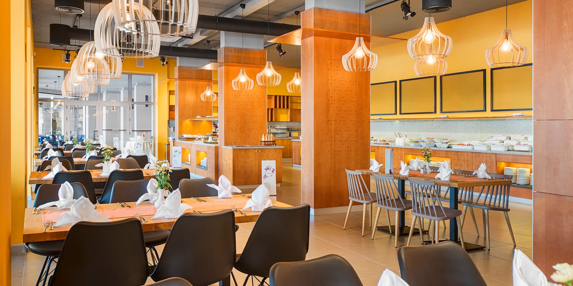 a restaurant with tables and chairs