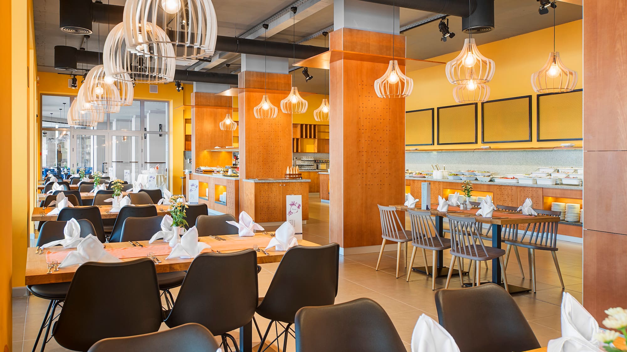 a restaurant with tables and chairs