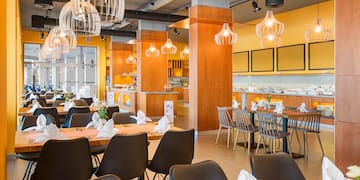 a restaurant with tables and chairs